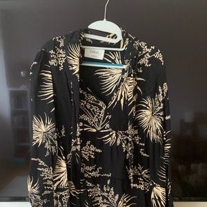 Black and cream dress with motif